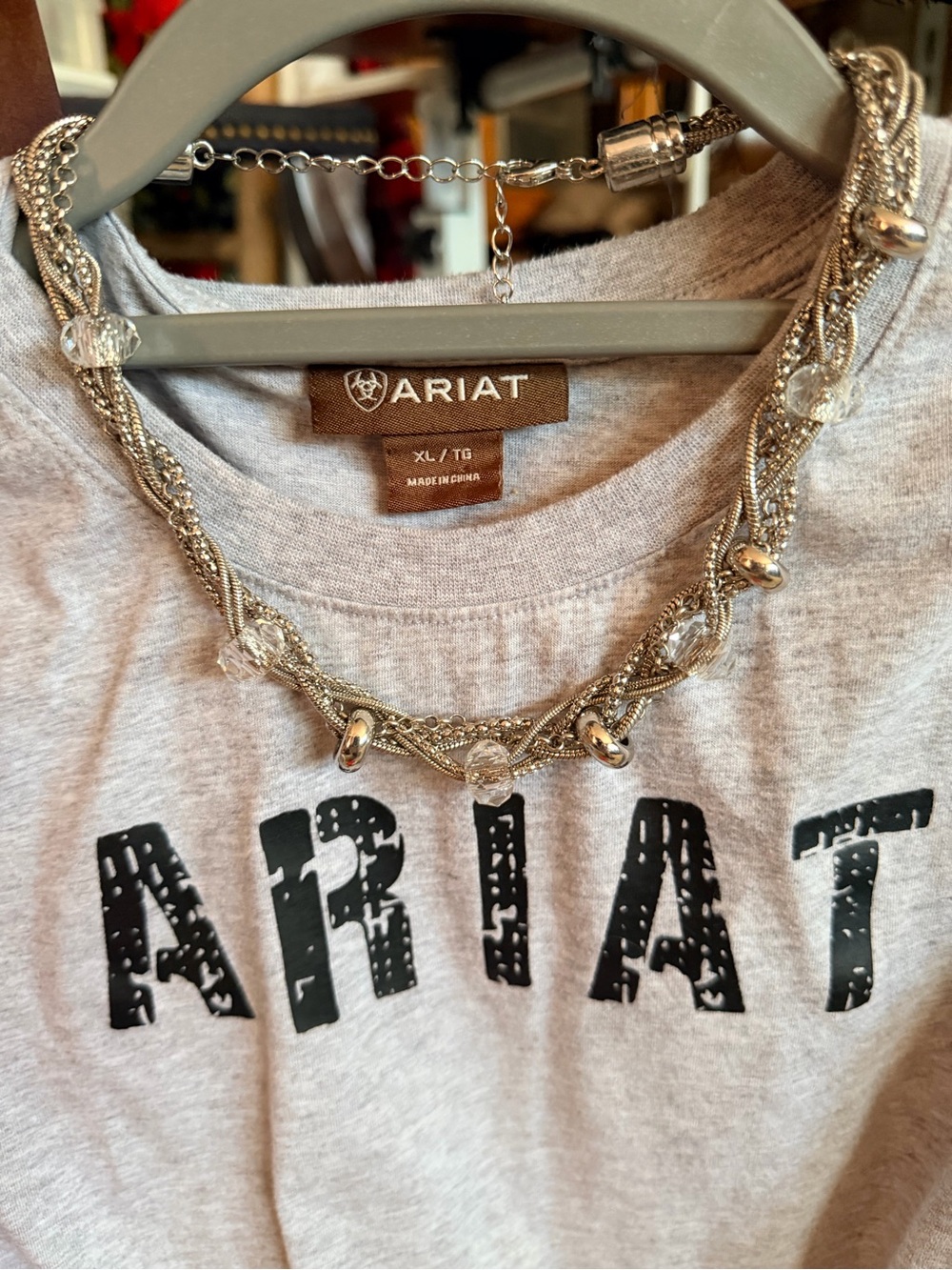 Silver tone necklace with silver and clear beads